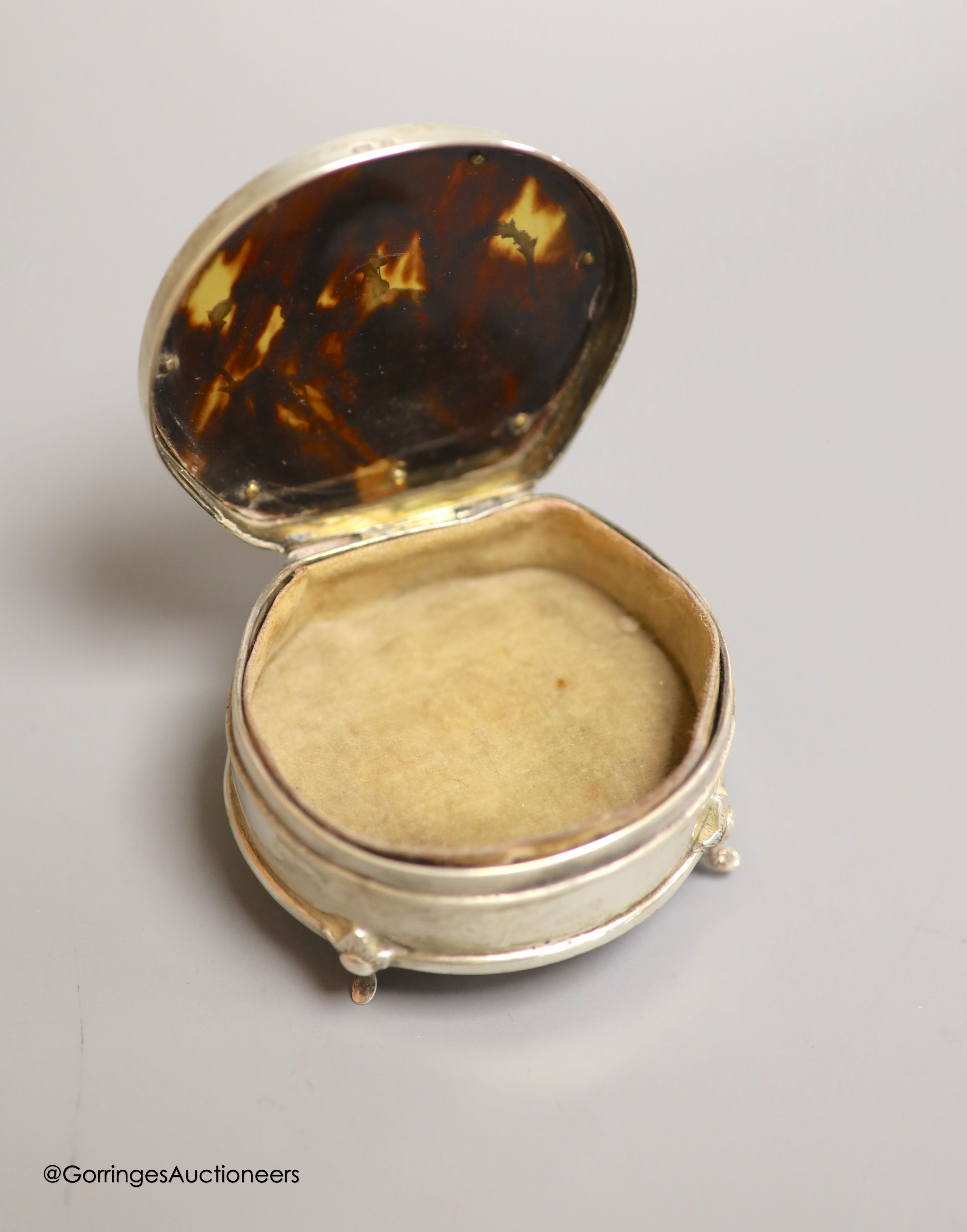 A George V novelty silver salt, modelled a s a font, with engraved inscription relating to the Company of Inhoulders, London, 1911, height 68mm, together with an Edwardian silver and tortoiseshell pique mounted trinket b